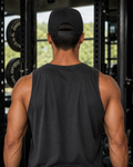 AI-generated gym lifestyle visualisation — ANIMAL AMBITION Lion Training Cap, Black, back view. Plain rear with plastic snapback. Refer to supplier mockups for product details.
